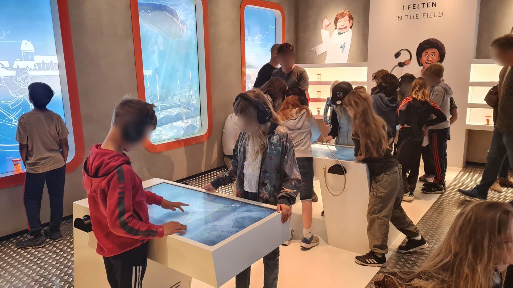 Children playing the interactive experience at MoMuLab