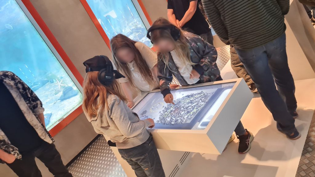 Children playing the interactive experience at MoMuLab